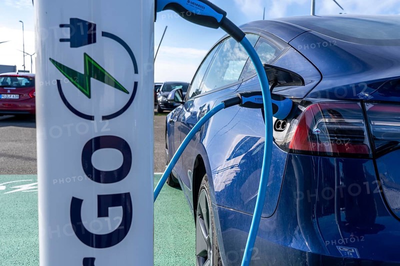 Electric car fast charging station, from the Dutch provider PowerGo, in the ferry harbour of Eemshaven, powered by renewable energy, Netherlands