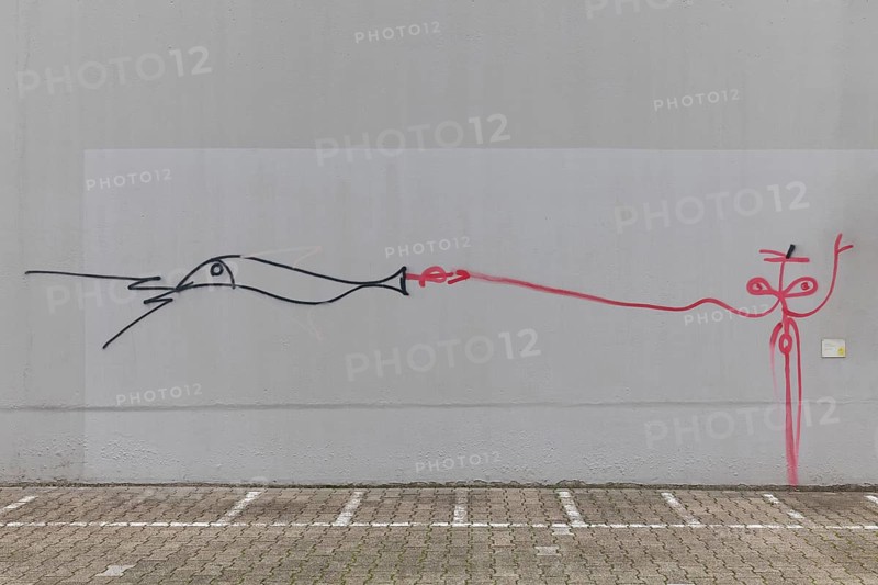 Stick figure and fish, abstract figures, line drawing by street artist Harald Naegeli, sprayer from Zurich, Düsseldorf, North Rhine-Westphalia, Germany, Europe