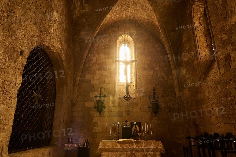 Chancel of the monastery church, interior of a church with illuminated altar and Gothic window, Monastery of Our Lady of Mount Filerimos, Filerimos, hill not far from Rhodes Town, Ancient State of Ialyssos, Rhodes, Dodecanese, Greek Islands, Greece, Europe