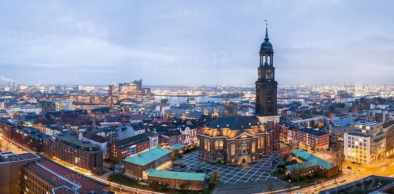Panorama aerial view of St. Michael's Church (Michel) at blue hour with harbour and Elbe Philharmonic Hall, Hamburg, Germany, Europe