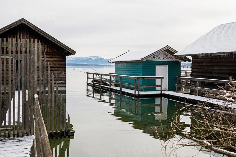Boathouses with snow in winter, Tutzing, Lake Starnberg, Fünfseenland, Pfaffenwinkel, Upper Bavaria, Bavaria, Germany, Europe