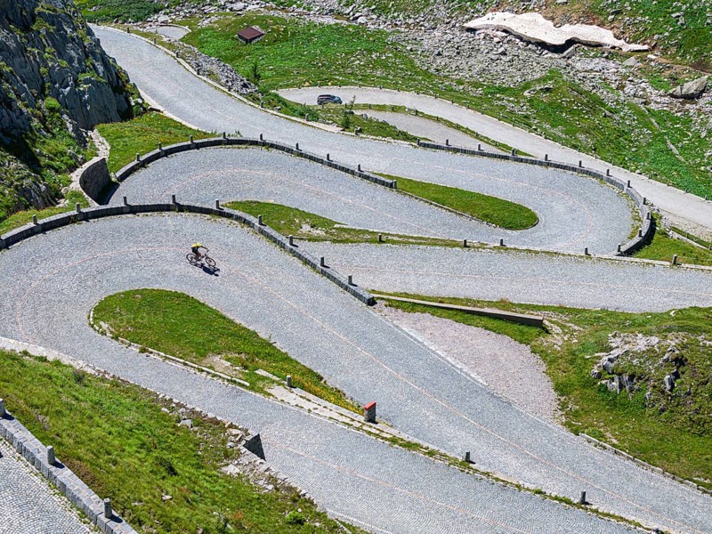 La Tremola, the world-famous serpentine road through the Val Tremolo. The Tremola road is the longest road construction monument in Switzerland with 24 hairpin bends. Old Gotthard Pass. Airolo, Canton Ticino, Switzerland, Europe