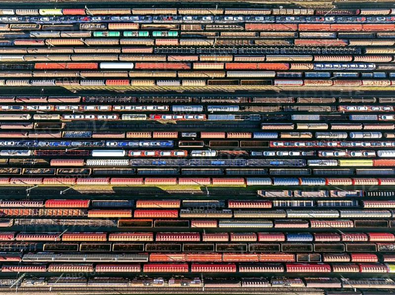 Deutsche Bahn AG marshalling yard. Many goods trains are parked on the tracks with tank wagons, car transporters and other wagons, companies transport a considerable part of their freight by rail, aerial view, Germany, Europe