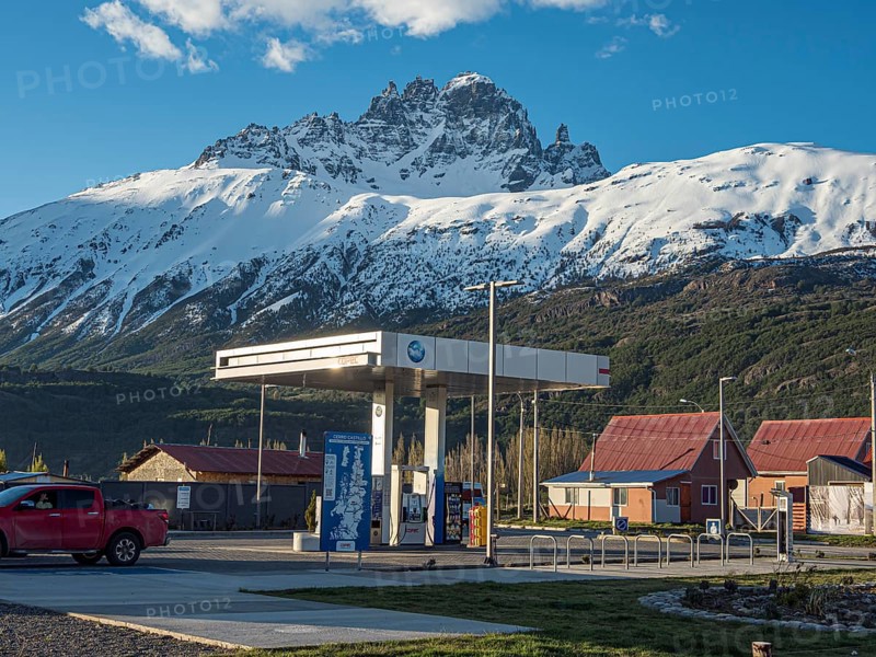 Gas station, Carretera Austral at Villa Cerro Castillo, snowcapped Mt .Cerro Castillo, Patagonia, Chile, South America