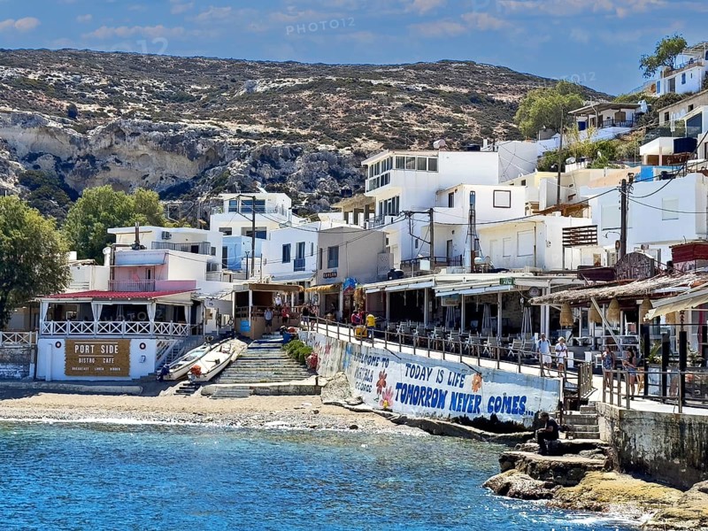 View of part of former fishing village Matala on south coast of Crete island in front of small beach on Mediterranean Sea, Matala, Crete, Greece, Europe