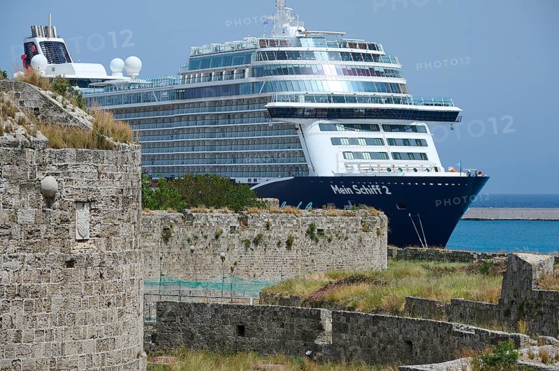 Large cruise ship near an old city wall on a sunny day, TUI, Mein Schiff 2, harbour area, Rhodes Town, Rhodes, Dodecanese, Greek Islands, Greece, Europe