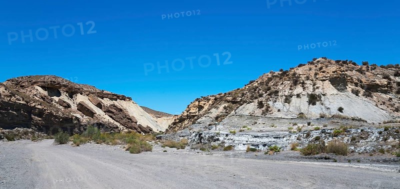 A barren desert landscape with rocky hills and a clear blue sky, La Tortuga, Tabernas Desert, Desierto de Tabernas, location of numerous films and westerns, Tabernas, Almeria, Andalusia, Spain, Europe