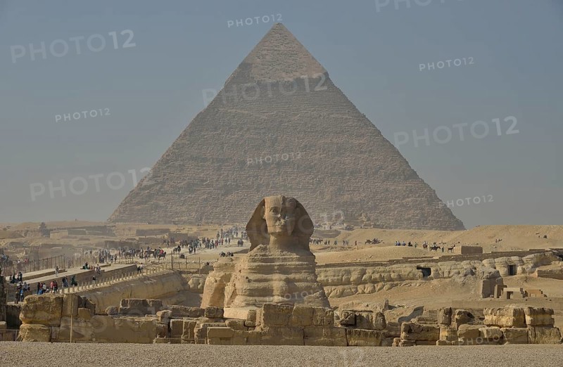 Sphinx or Great Sphinx of Giza, lion with a human head, built in the 4th Egyptian dynasty around 2700 BC, in front of the Pyramid of Chephren, Giza, Egypt, Africa
