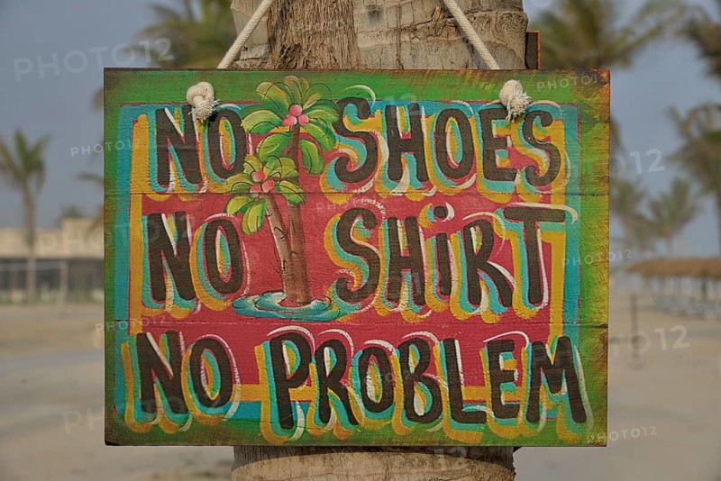 Sign "No shoes, no shirt, no problem" on the beach of Salalah Rotana Resort, Salalah, Dhofar Region, Oman, Asia