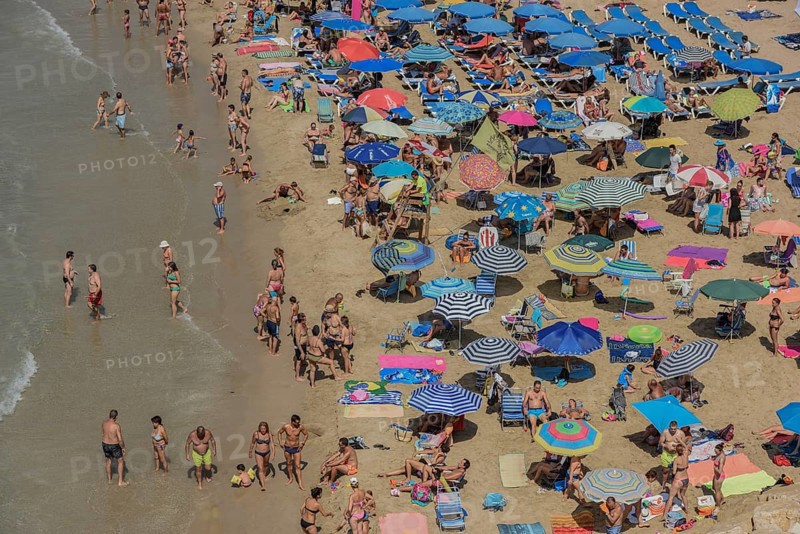 Tourists at the Playa Mal Pas, Benidorm, Province of Alicante, Costa Blanca, Spain, Europe