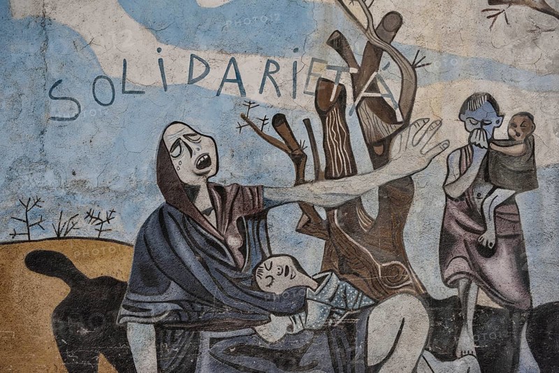 Political mural, cubism, solidarity, poverty, mother and child, Orgòsolo, Province of Nuoro, Sardinia, Italy, Europe