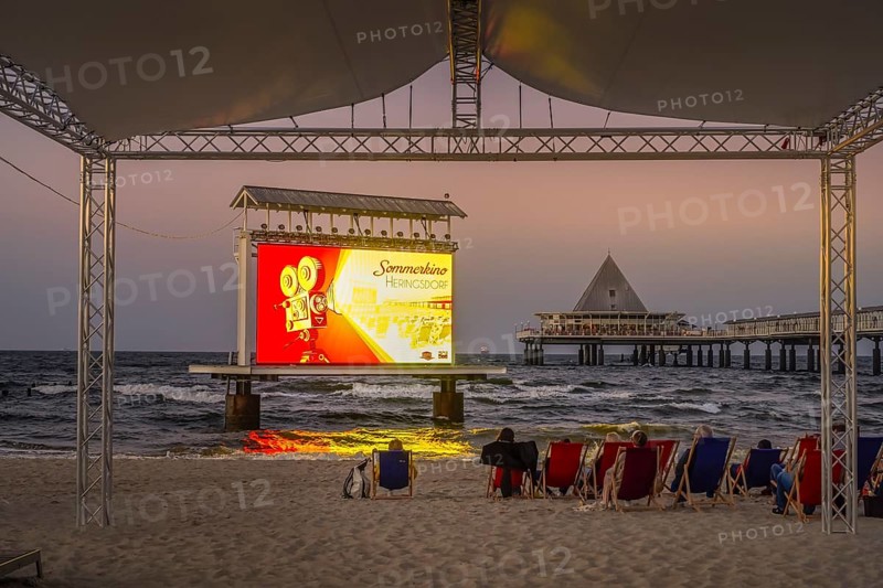 Summer cinema on the beach, screen, LED projection in the sea, Baltic Sea, Heringsdorf, Usedom, Mecklenburg-Vorpommern, Germany, Europe
