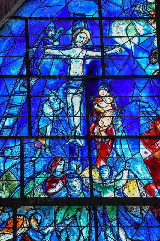 Detail Crucifixion of the stained glass window of La Paix, the Peace, by Marc Chagall, Chapelle des Cordeliers, Franciscan chapel from the 18th century, Sarrebourg or Saarburg, Moselle, region Grand Est, Lorraine, France, Europe