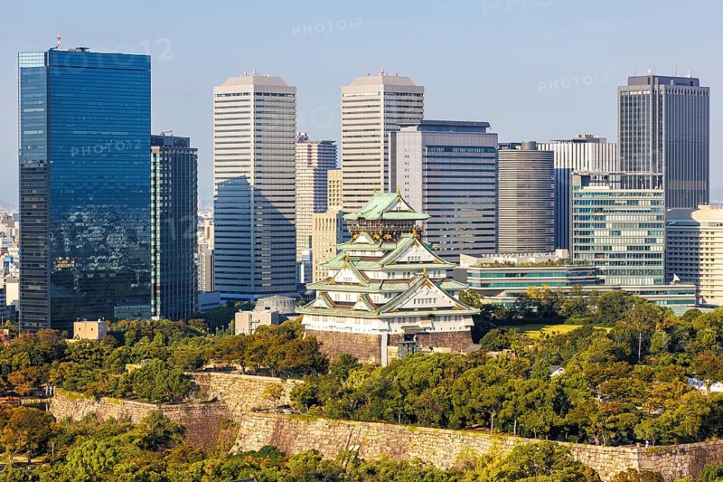 Osaka Castle from above with the skyline skyscrapers in Osaka, Japan, Asia