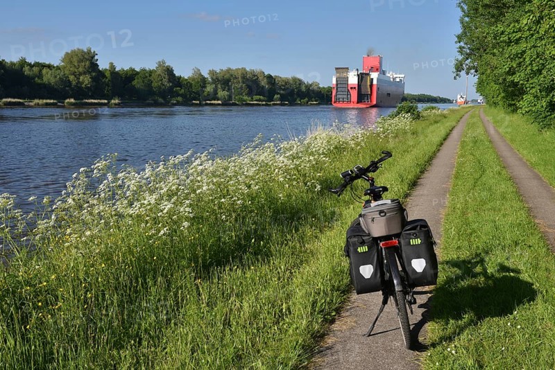 Bicycle tour along the Kiel Canal with ship sightseeing, Germany, Europe