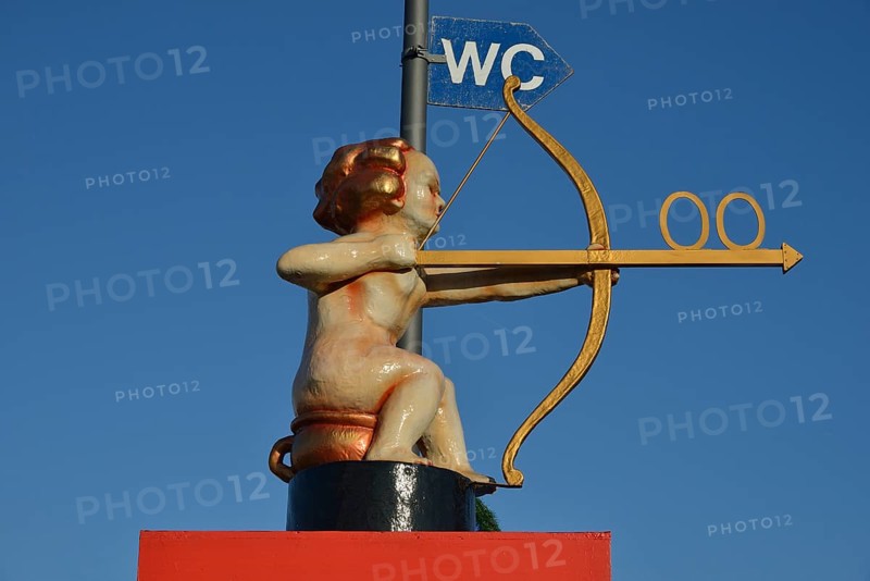 Archer Cupid as a toilet sign, Oktoberfest, Munich, Upper Bavaria, Bavaria, Germany, Europe