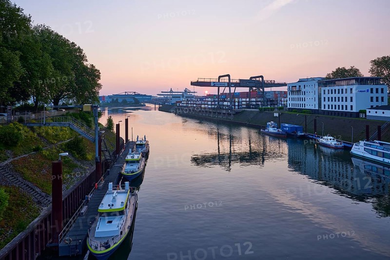 Vincke Canal with container bridge of duisport, Duisburger Hafen AG at sunrise in Ruhrort, Duisburg, Ruhr area, independent city, North Rhine-Westphalia, Germany, Europe