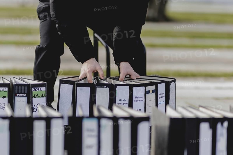 Files are cleared away after a protest action by the German Confederation of Skilled Crafts in front of the Federal Chancellery in Berlin, 26 February 2024. The German Confederation of Skilled Crafts demonstrates against the economic policy of the federal government as well as the high level of bureaucracy and the improvement of location conditions