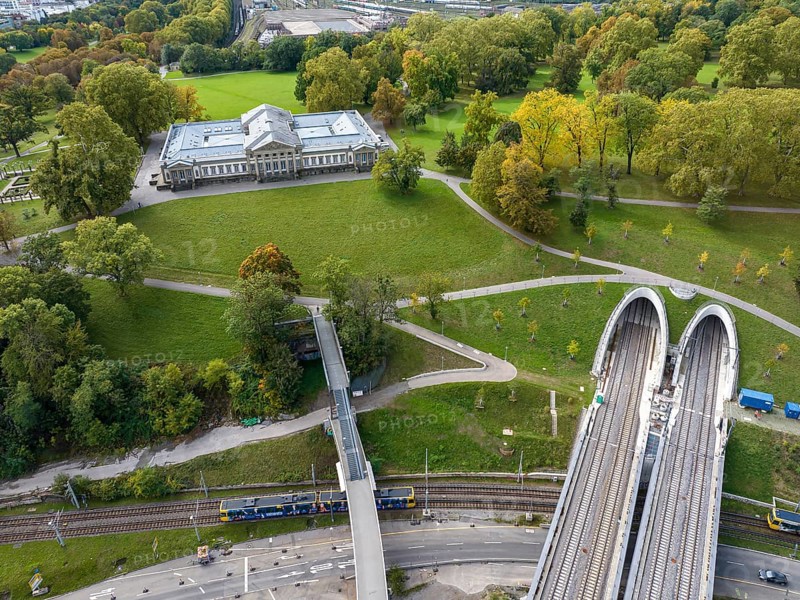 Deutsche Bahn AG's new Neckar Bridge, part of the Stuttgart 21 project. The tracks lead into the Rosenstein Tunnel through Rosenstein Park. Aerial view, Rosenstein Castle on the left. Stuttgart, Baden-Württemberg, Germany, Europe