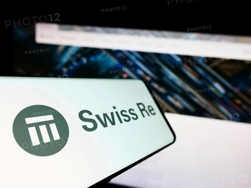 Stuttgart, Germany, 10-24-2022: Mobile phone with logo of reinsurance company Swiss Re on screen in front of business website. Focus on center-left of phone display, Europe