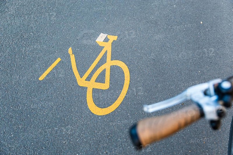 Detached pictogram of a pop-up cycle path with cyclist, Düsseldorf, Germany, Europe