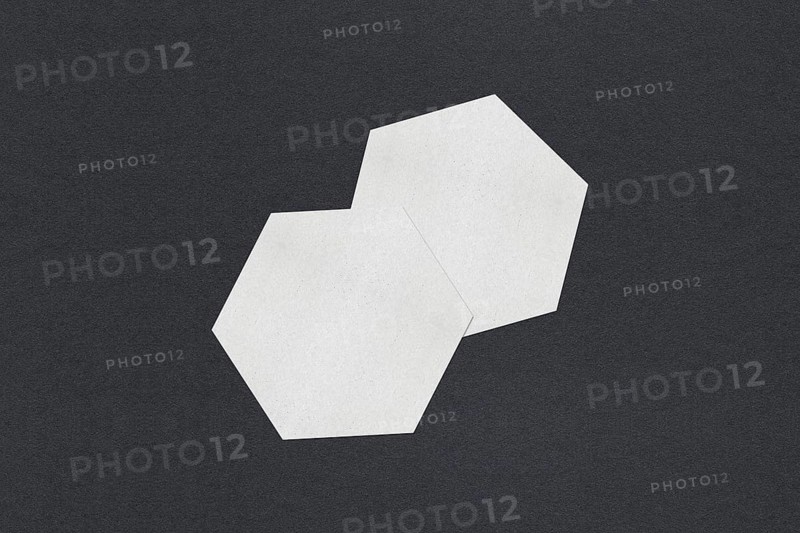 Two white hexagon shapes overlapping on a dark background, Blank white Business card mockup stacks at grey textured paper background