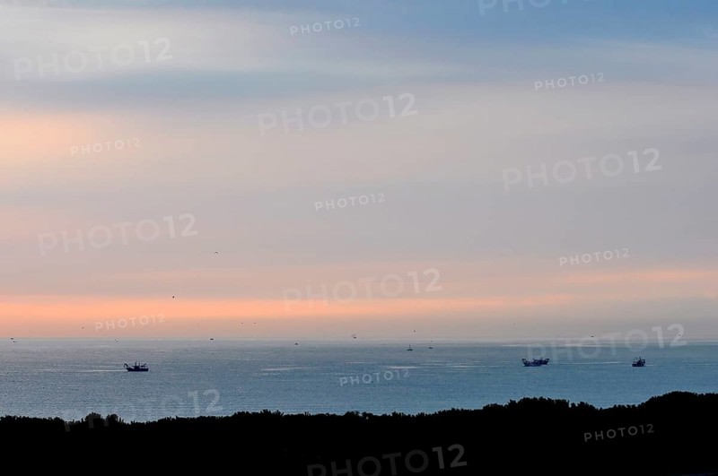 Italy, Emilia Romagna, Adriatic Sea, sunrise, fishing boats near Cervia, Europe