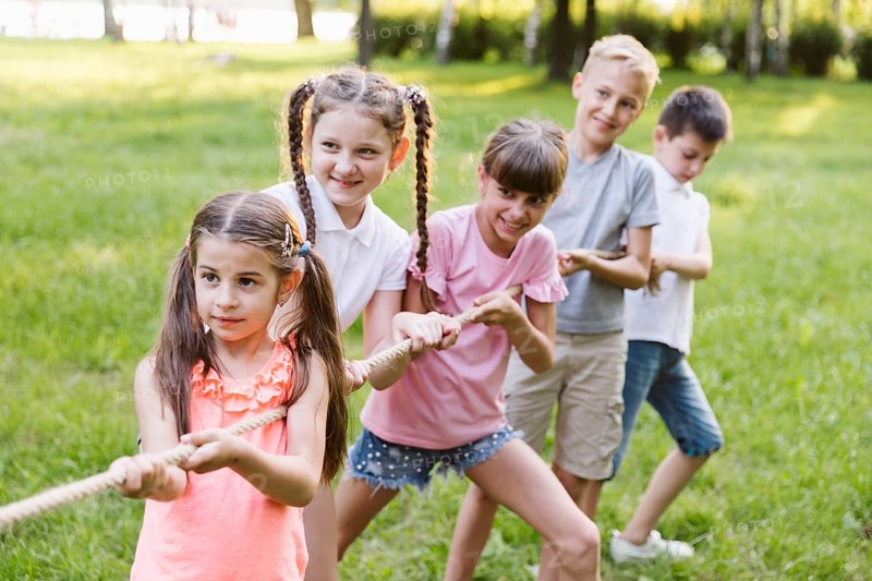Kids having fun tug war