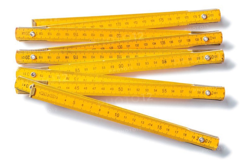 Opened yellow wooden counter culler against a white background