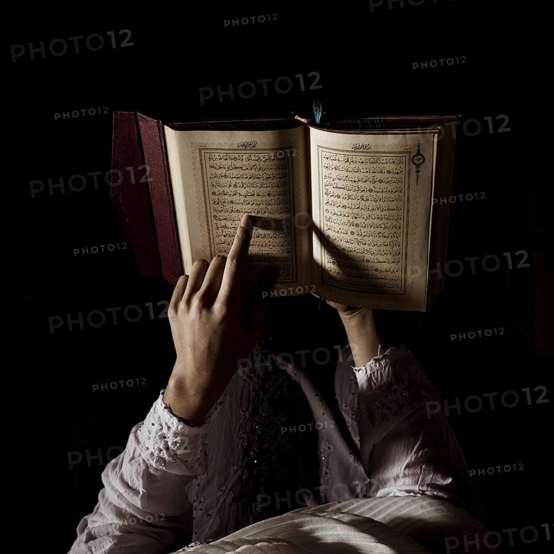 Silhouette woman reading quran. Resolution and high quality beautiful photo