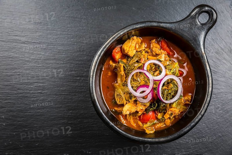 Delicious savoy cabbage stew or soup with chicken