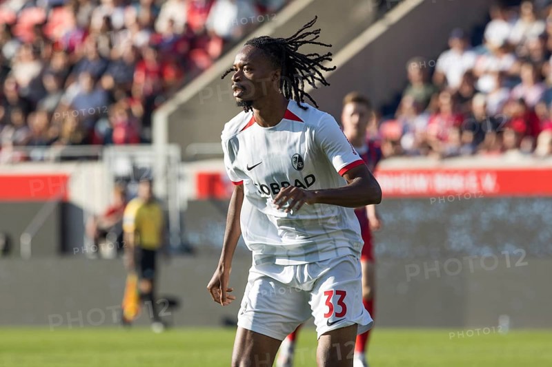 Football match, Jordy MAKENGO SC Freiburg attentively watching an action with view to the left, football stadium Voith-Arena, Heidenheim