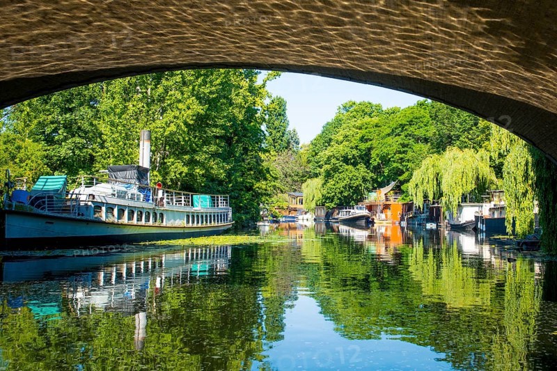 Berlin, Germany, June 2022: View on houseboat on the Spree river in Berlin in Tiergarten, Europe