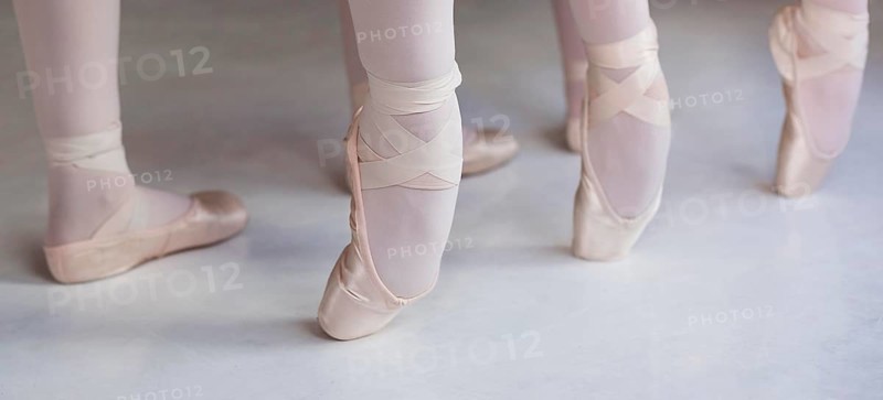 Professional ballet dancers training together pointe shoes