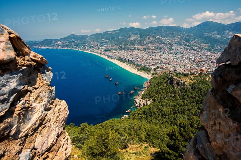 View from the castle hill over the town of Alanya with Klopatra Beach and tourist boats, Turkish Riviera, South Turkey, Turkey, Asia Minor, Eurasia, Asia