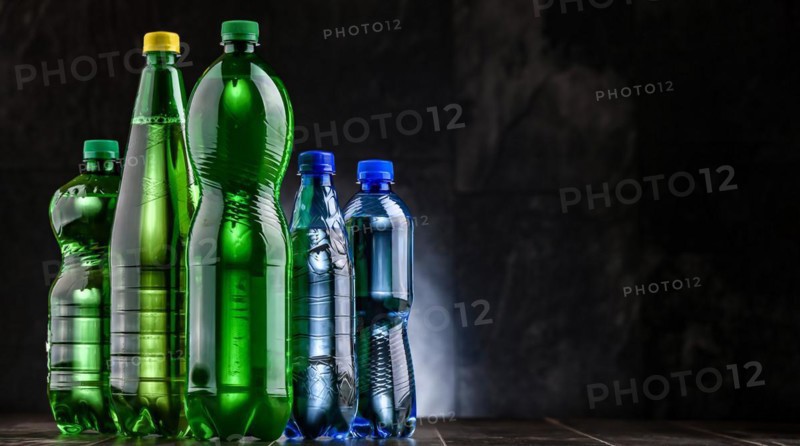 Plastic bottles of assorted carbonated soft drinks