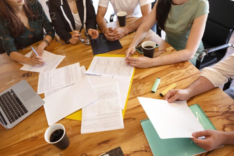 Business team hands on the table at work