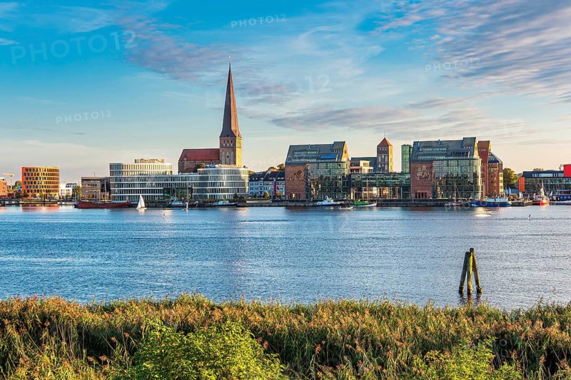 View across the Warnow to the Hanseatic city of Rostock in the evening