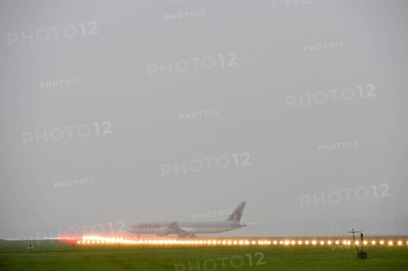 Overview Munich Airport with Qatar Airways, Boeing B787 Dreamliner take-off during thunderstorm, heavy rain, rain cloud, storm, control tower, southern runway, Terminal 2, Munich Airport, Upper Bavaria, Bavaria, Germany, Europe