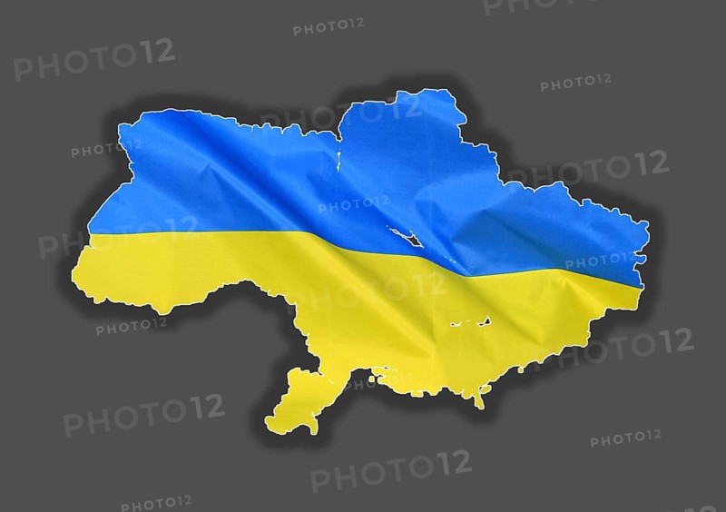 Outline map of Ukraine designed with the national flag