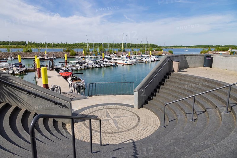 Lake Zwenkau. Lake Zwenkau is currently the last lake from the former open-cast lignite mine in the south of Leipzig that was opened for tourist use in 2015. Harbour facilities with berths, restaurants and holiday apartments