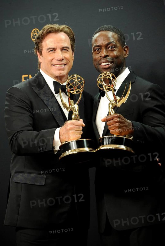 John Travolta and Sterling K. Brown at the 68th Annual Primetime Emmy Awards, Press Room held at the Microsoft Theater in Los Angeles, USA on September 18, 2016