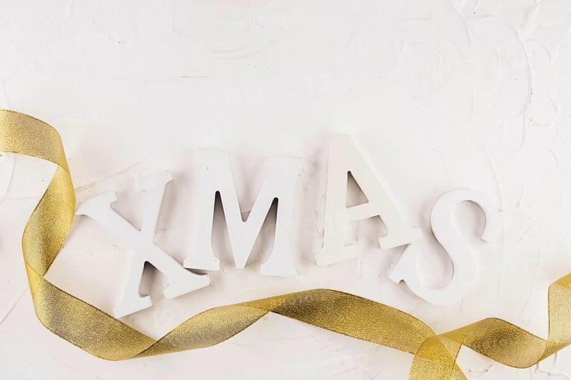 Xmas inscription with gold ribbon