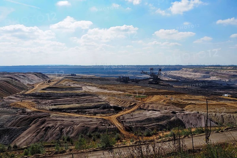 View over the Garzweiler open-cast lignite mine with large excavator, Rhenish lignite mining area, Germany, Europe