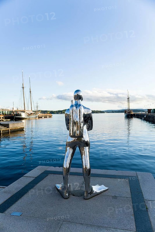 Silver diver sculpture in Oslo harbour, Norway, Europe