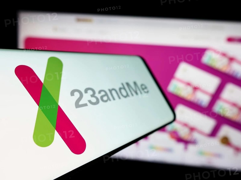 Stuttgart, Germany, 11-03-2023: Mobile phone with logo of American biotechnology company 23andMe Inc. in front of business website. Focus on left of phone display, Europe