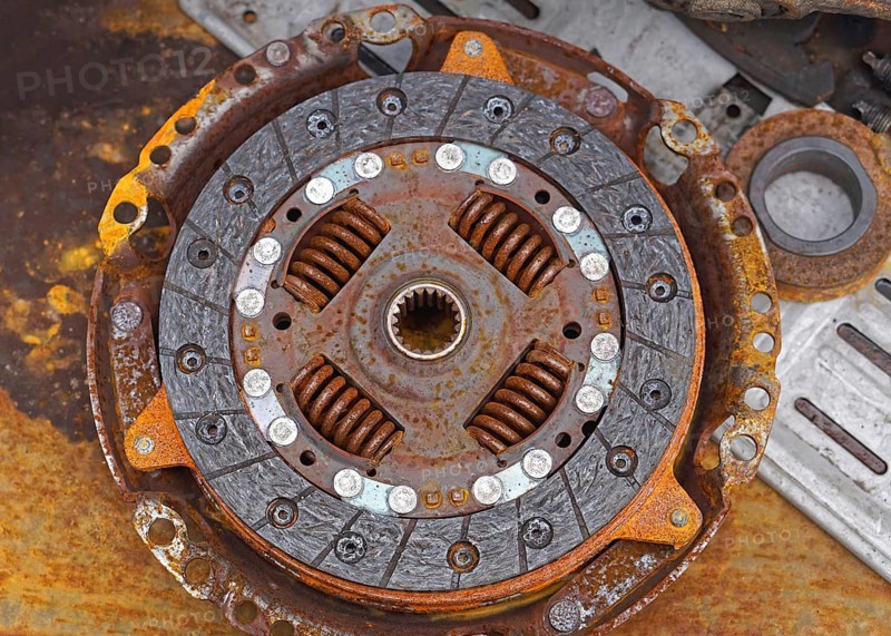 Rusty old clutch disc car parts