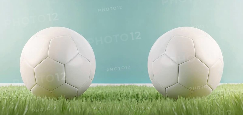 Two white football balls placed against each other on the green grass. Soccer scoreline symbols with copy space for match announcements. Tournament rivalry. Ai generated art