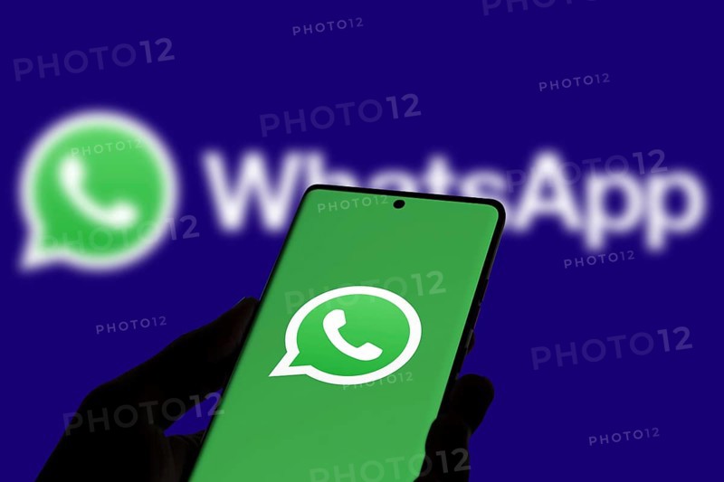 WhatsApp logo is displayed on smartphone.