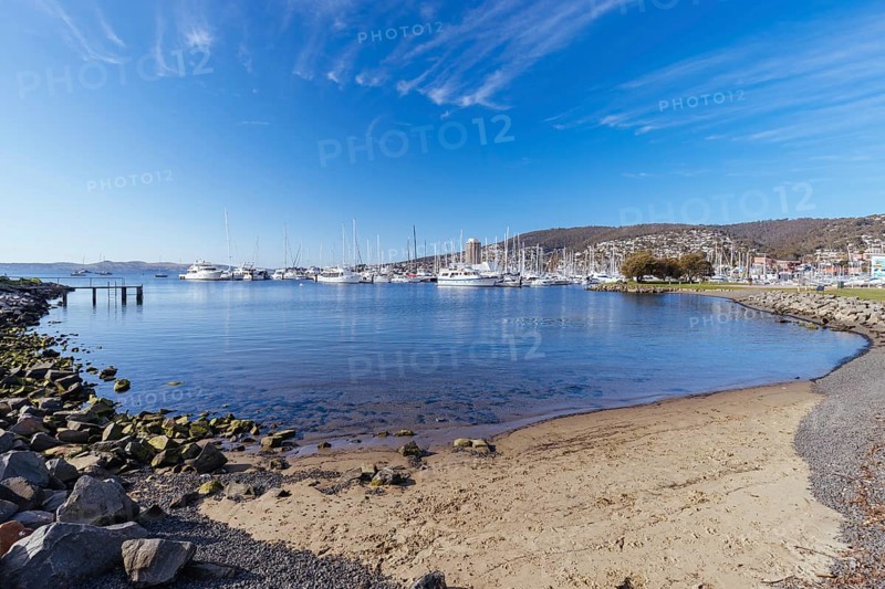 HOBART, AUSTRALIA, SEPTEMBER 15, 2022: A view towards Sandy Bay from Errol Flynn Reserve on a spring morning in Battery Point, Hobart, Tasmania, Australia, Oceania